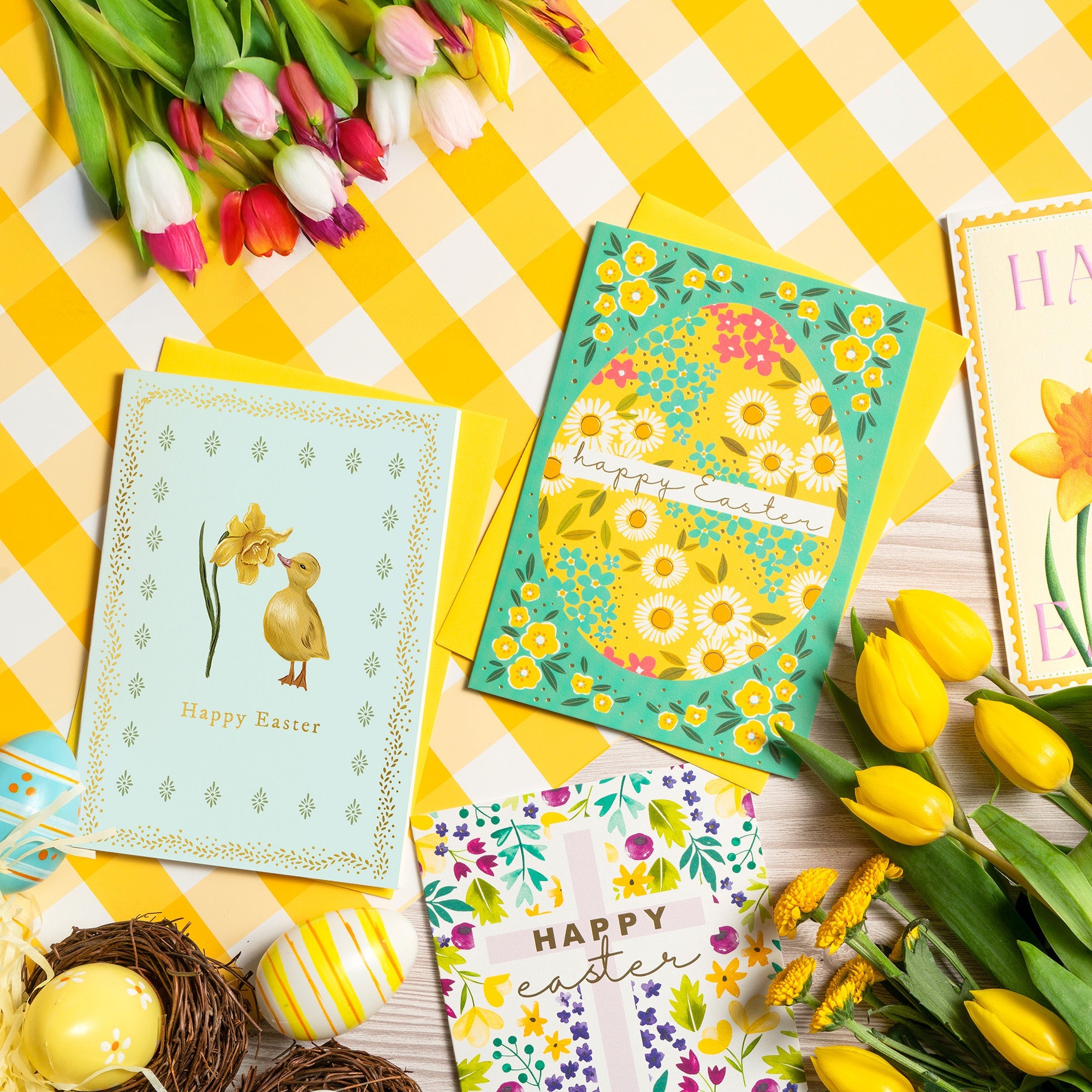 Easter cards on display with flowers