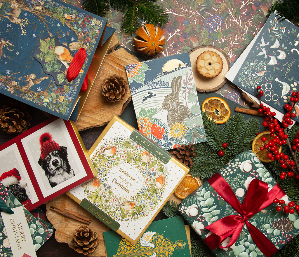A selection of Christmas cards amongst festive items.
