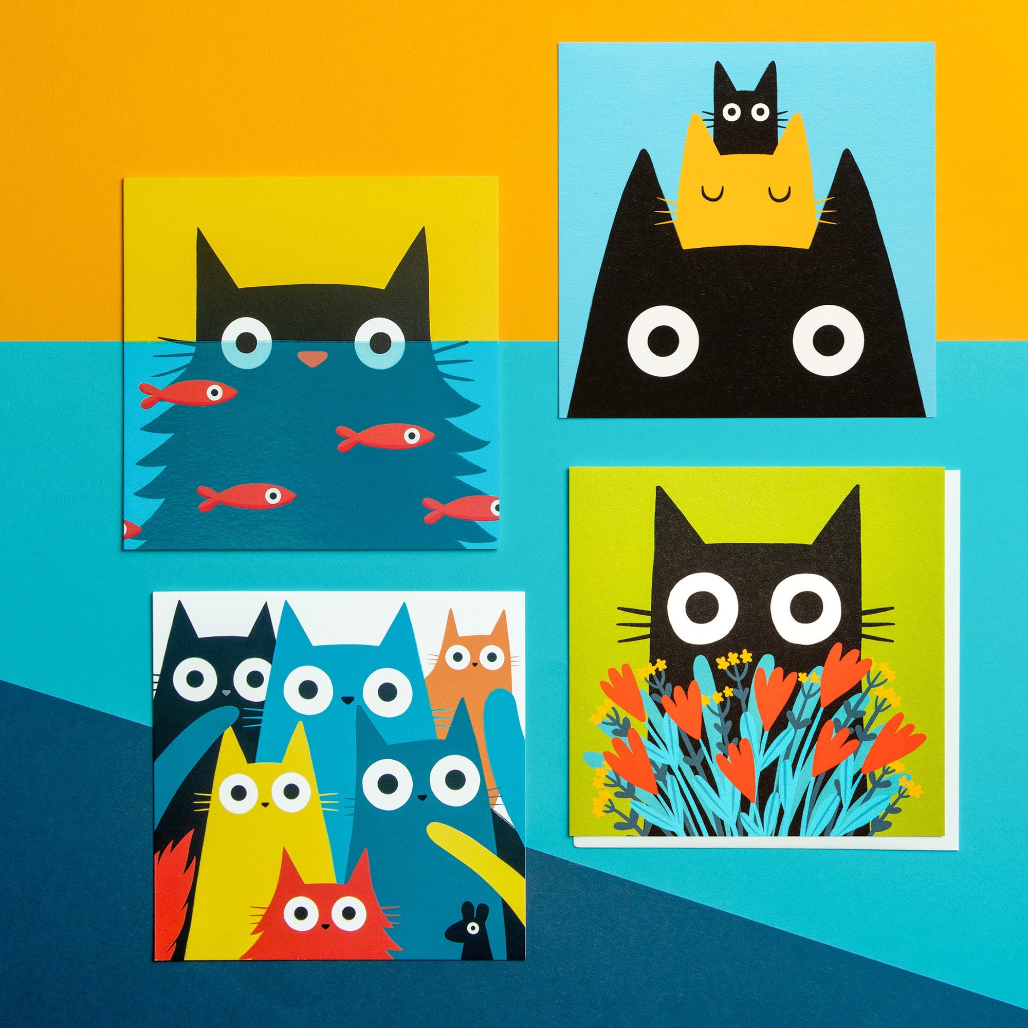 A colourful collection of Cat Walk cards are laid out of a bright and colourful background.