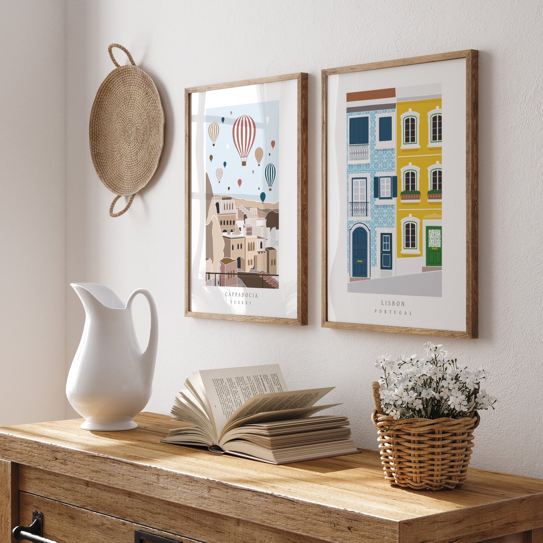 Art print featuring the famous hot air balloons floating over Cappadocia in Turkey. Art print is hung on a wall with an art print of the city of Lisbon.