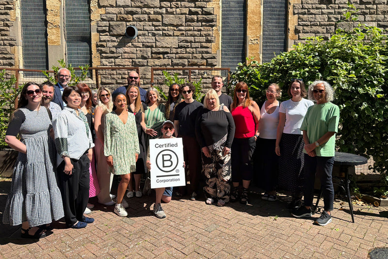 The Art File team celebrating B Corp together in a photo.