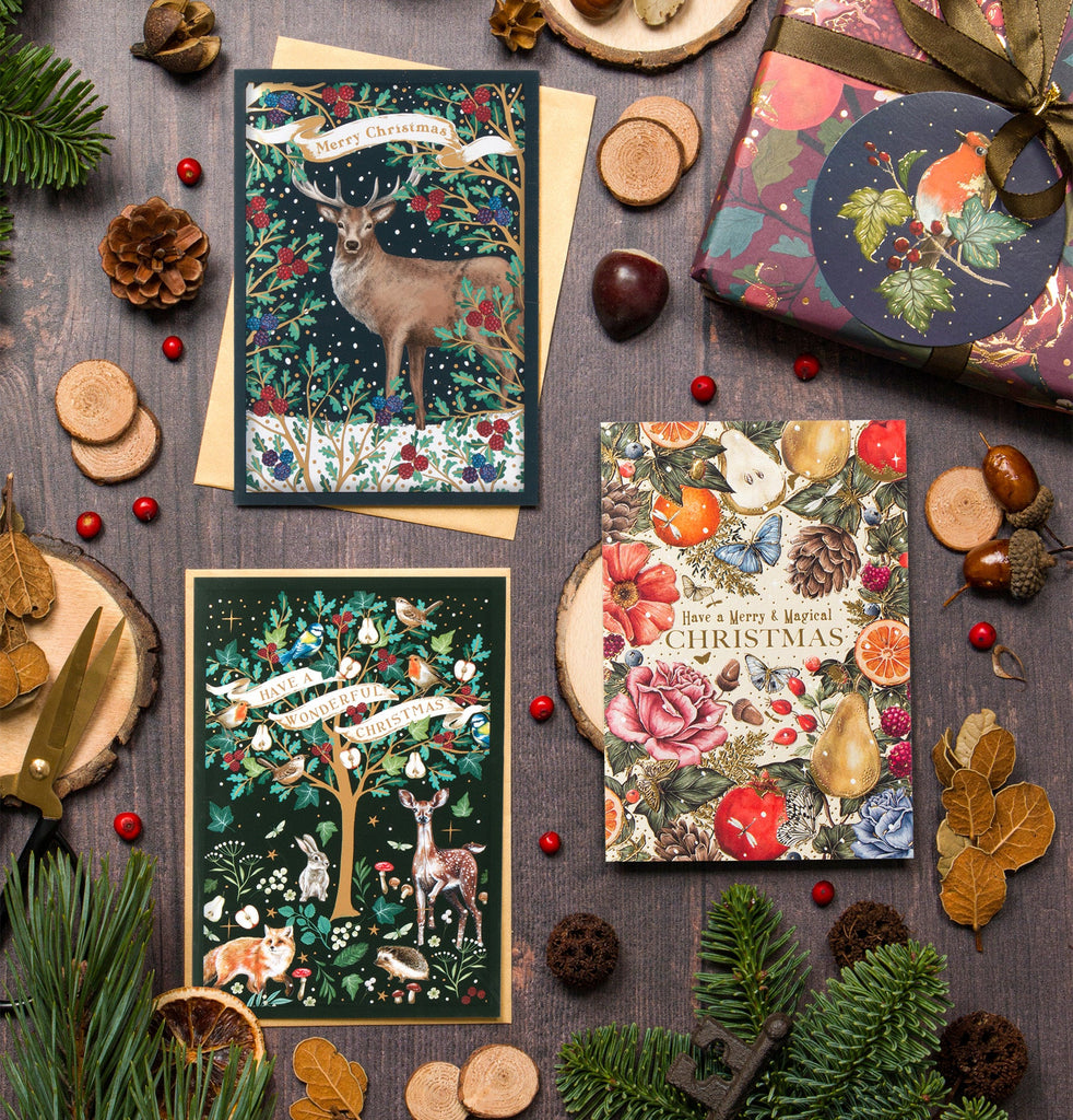 A selection of Christmas single cards on a table.