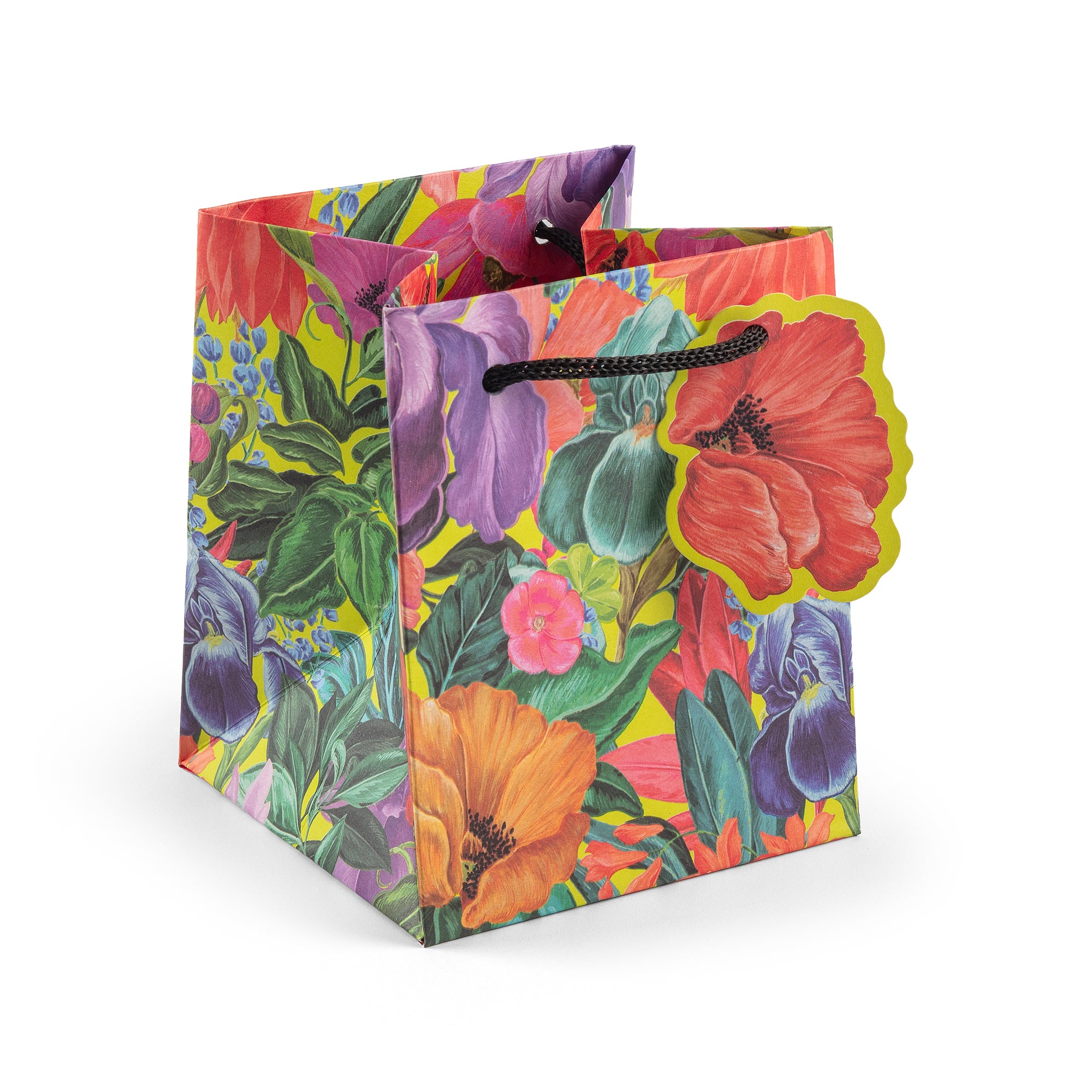Colorful floral gift bag on a white background