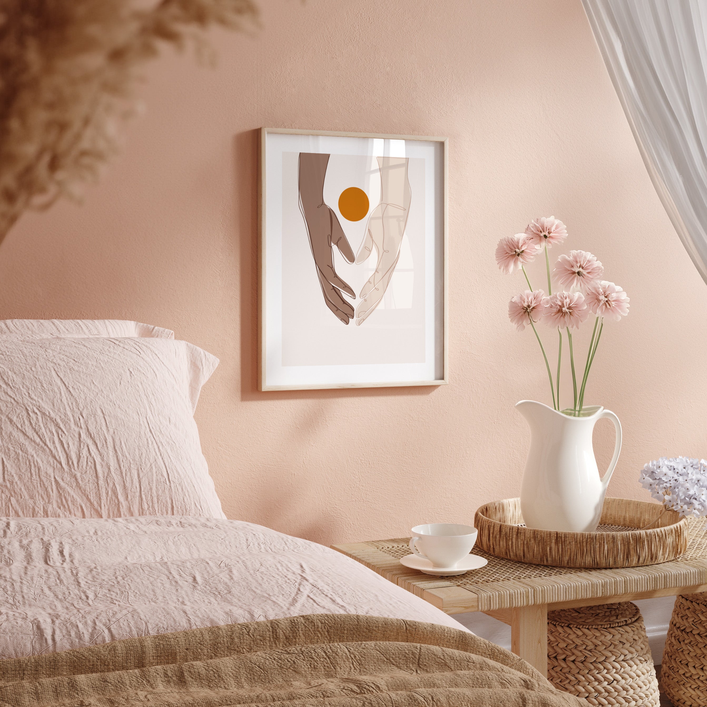 Bedroom with a bed, bedside table, and wall art on a pink wall.