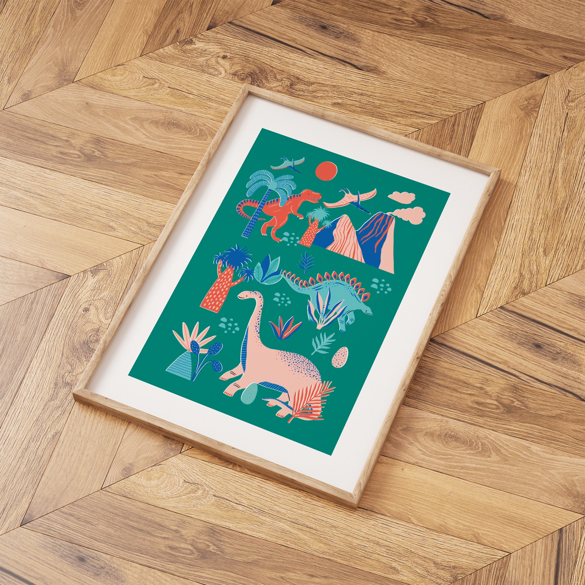 Framed artwork with coluorful dinosaur illustration on a wooden floor.